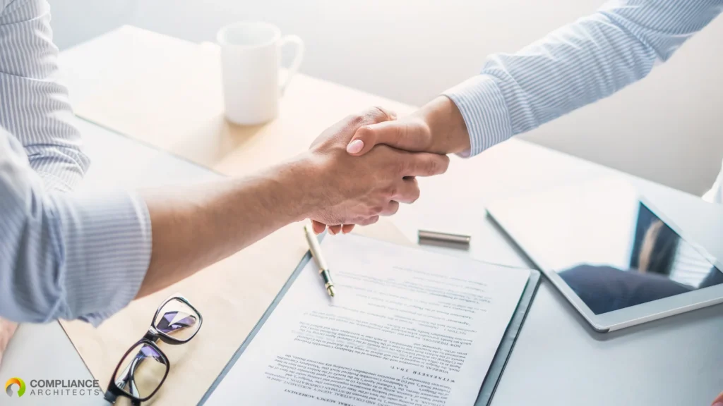 shaking hands to operationalize a quality agreement