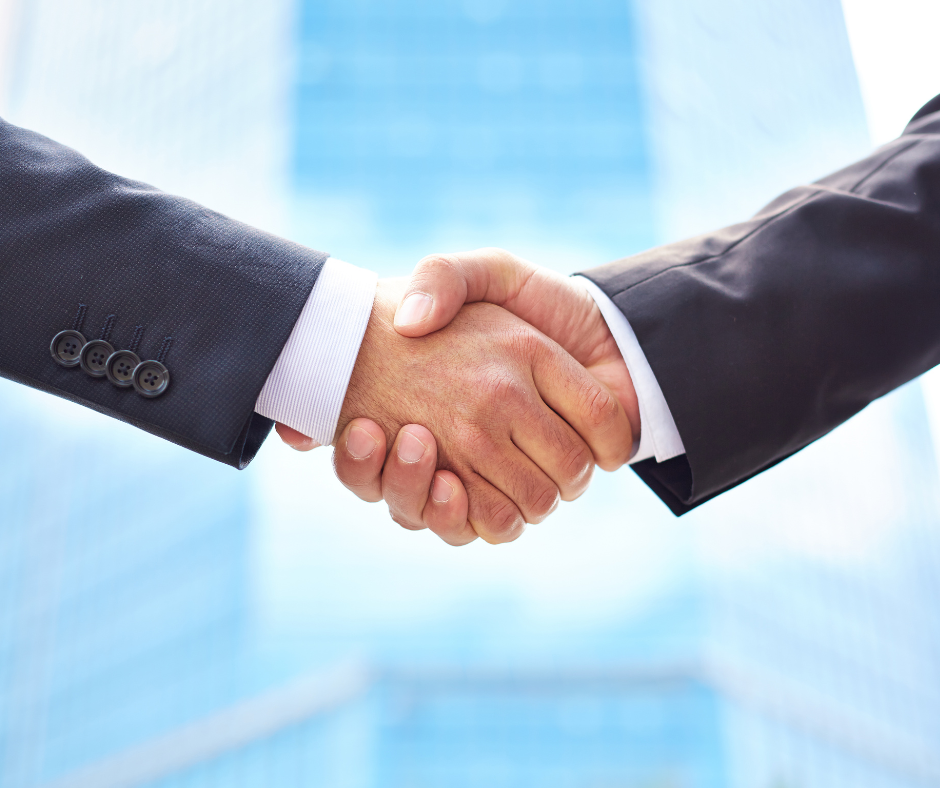 shaking hands - Aligning Quality Objectives with Business Goals: Making Quality a True Business Partner 